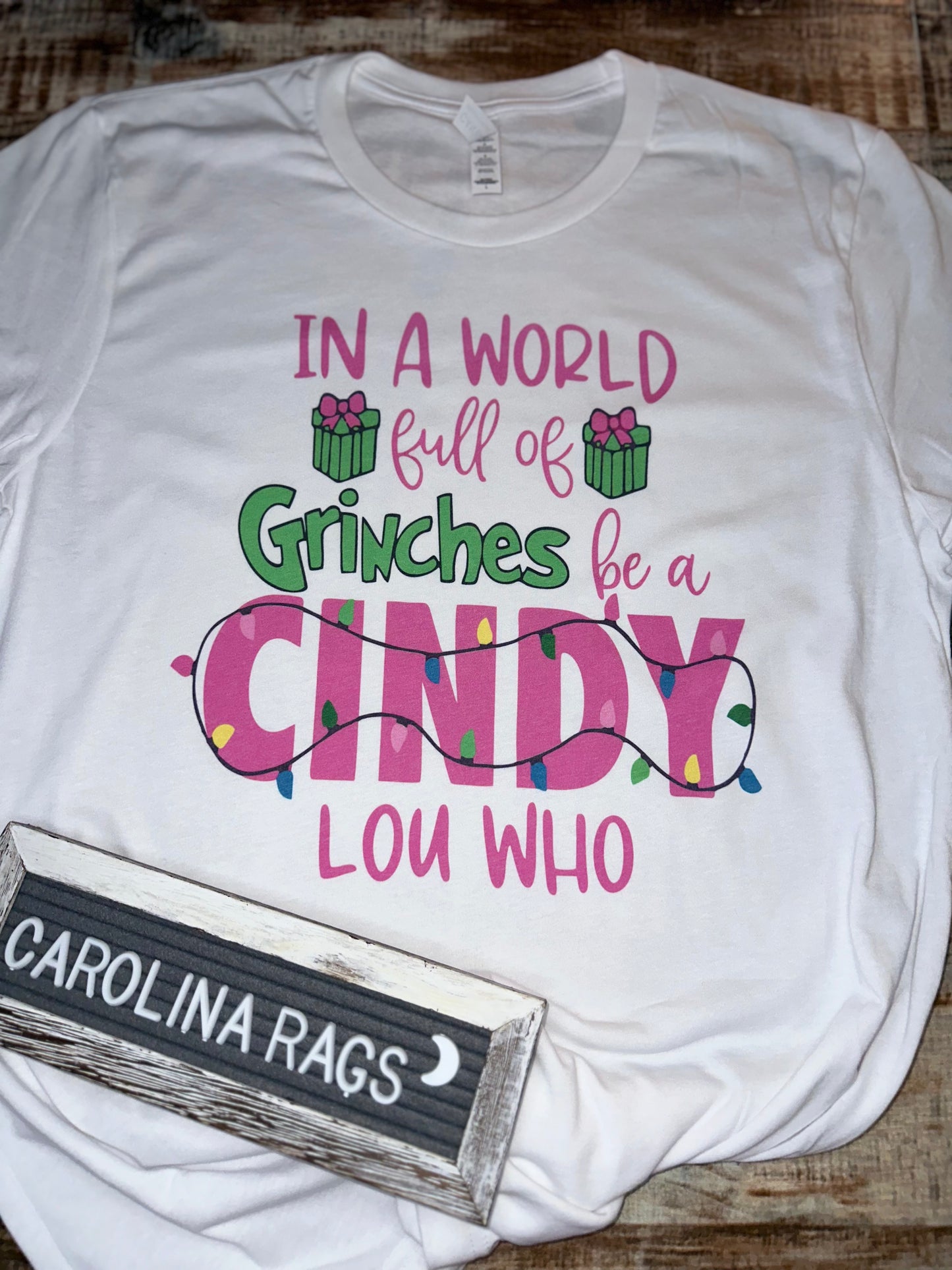 In a world full of Grinches, be a Cindy Lou Who tee