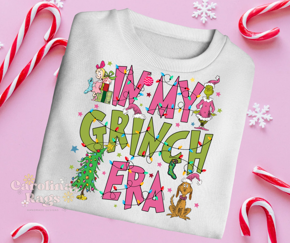 In my Grinch Era sweatshirt